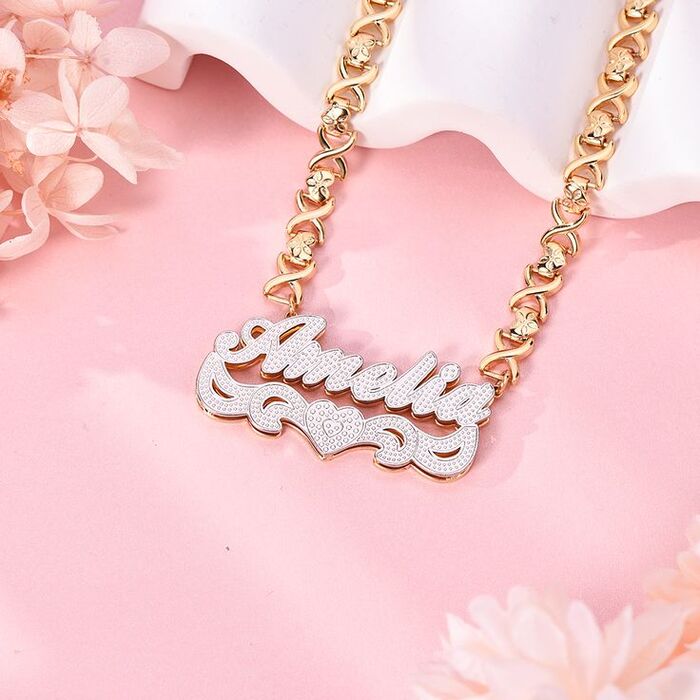 Personalized jewelry, such as necklaces, bracelets, or rings with her name or initials